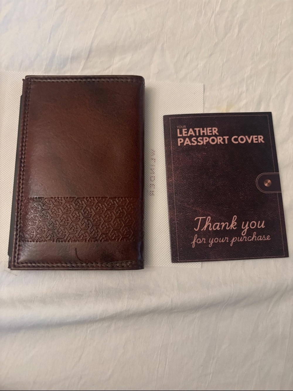 WLINDER Brown Leather Passport Wallet with Embossed Geometric Band .